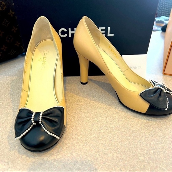 CHANEL Shoes Chanel Beige And Black Pumps With Pearl Embellished